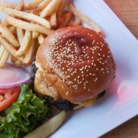 Classic Angus Burger · Leaf lettuce, beef steak tomato, pickle and onion. Fresh homemade patty on our signature bri...