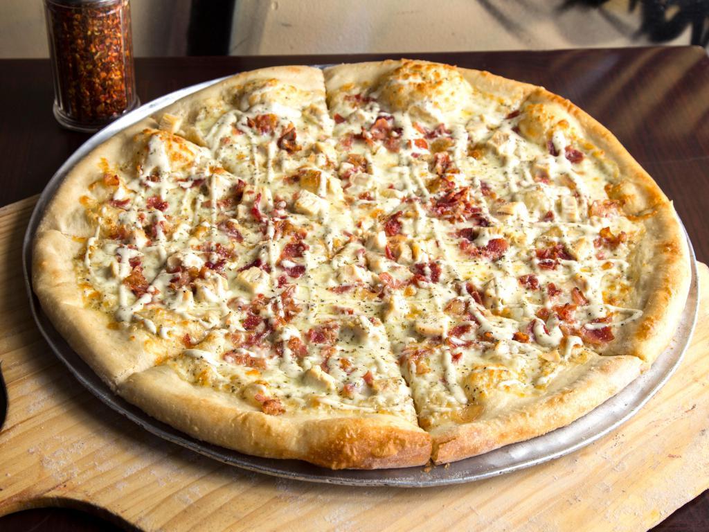 Chicken Bacon Ranch Pizza · Our house made ranch, grilled chicken and bacon.