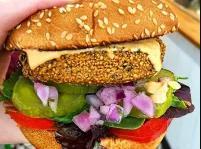 Earth Burger · Vegan falafel burger served with a side of sweet potato fries. Vegan.