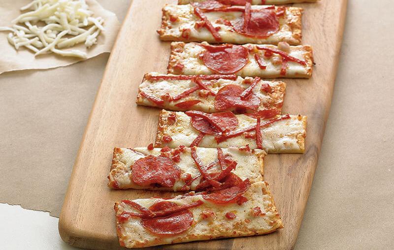 Pepperoni Extreme Flatbread · Pepperoni sliced, diced + julienned, BJ's signature five cheese blend, zesty pizza sauce