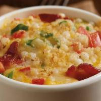 Creamy Couscous Mac & Cheese · Israeli couscous, jack + cheddar cheese sauce, chopped bacon, tomatoes, green onions, parmes...