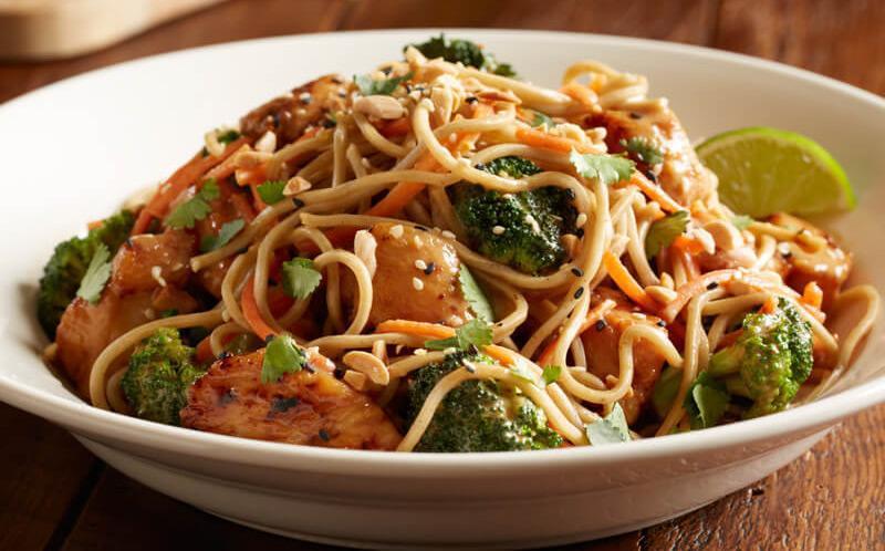 Spicy Peanut Chicken With Soba Noodles · Chicken breast, buckwheat soba noodles, broccoli, carrots, spicy peanut sauce, almonds, sesame seeds, lime, cilantro, buckwheat soba noodles