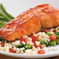 Cherry Chipotle Glazed Salmon* · Oven-roasted atlantic salmon, sweet, savory cherry chipotle glaze, roasted asparagus, fire-r...