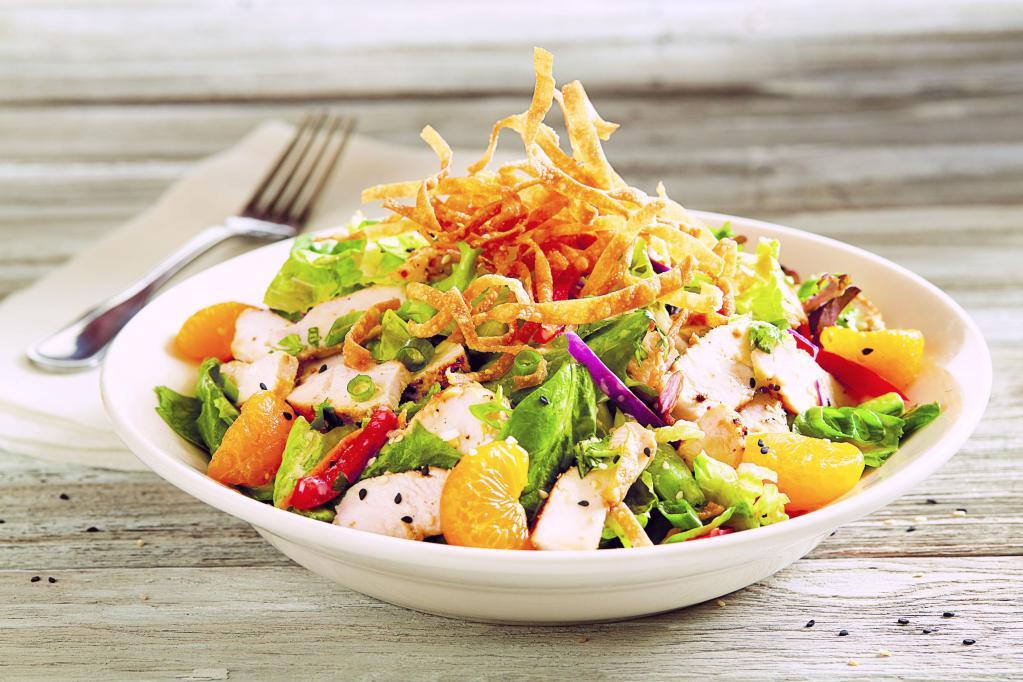 Asian Chopped Salad · Grilled chicken, baby field greens, napa cabbage, romaine, red bell peppers, snap peas, green onions, carrots, sesame seeds, crispy wonton strips, cilantro, mandarin oranges, honey ginger dressing