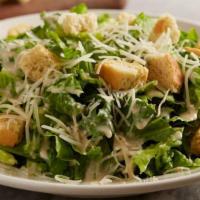 Caesar Salad · Crisp romaine, oven-baked croutons, parmesan cheese, creamy caesar dressing