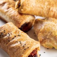 Paneer Puff · Cottage Cheese, Onions, Mild Spice Wrapped & Baked in Buttery Puff Pastry