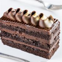 Dream Dark Chocolate · a big bite of rich chocolate layered cake under a creamy chocolate ganache 