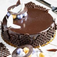 Chocolate Cake · Dream Dark Chocolate- a big bite of rich chocolate layered cake under a creamy chocolate gan...