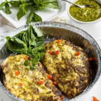 Pesto Marinated Grilled Chicken · Smothered in a creamy basil pesto, this chicken is deliciously good, low carb and makes a he...