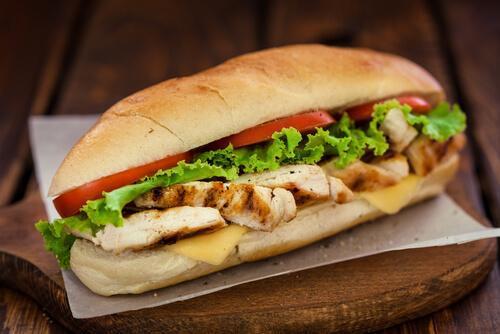Grilled Chicken Sandwich · Home grilled chicken, perfectly grilled vegetables, tomato, lettuce, fresh peppers, mushrooms and a refreshing chimichuri balsamic dressing. 