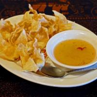 3. 6 Pieces Crab Wonton · Crab blended with cream cheese fried crisp in wonton wrappers, served with plum sauce.