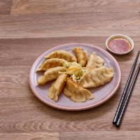 A6. Pot Sticker · Pan fried chicken and vegetable dumplings (8 pieces)