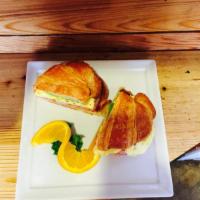 Breakfast Croissant · Tomato, onion, avocado, egg, lemon pepper, jack cheese on a fresh butter croissant. Served a...