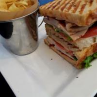 Oven Roasted Turkey On Focaccia · Turkey breast slices, muenster cheese, tomato, onion, lettuce, arugula garlic spread on ligh...