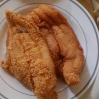 Fried Catfish · That familiar cornmeal crunch brings back memories of family fish fries.