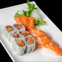 Spicy Salmon Combo · Three pieces of sushi, three pieces of sashimi and spicy salmon maki. Served with soup and s...