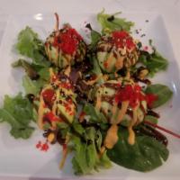 4 Pieces Dragon Ball · Spicy tuna, flake wrapped with avocado, eel sauce, spicy mayo and masago.