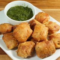Paneer Pakora · Deep fried cheese battered with chickpeas, flour and spice.