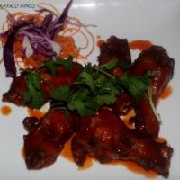 A9. Thai Buffalo Wings · Crispy marinated wings served with house buffalo sauce.