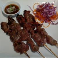 A14. Grilled Pork · Grilled marinated pork with Thai spices and served with homemade sauce.