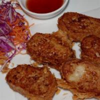 A15. Hoi Joh · Fried. Stuffed with shrimp and crab meat and served with plum sauce.