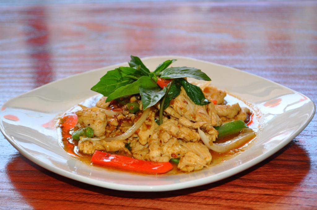 E1. Basil Sauce · Sauteed basil, string beans, carrots, onions, bamboo and bell peppers in basil sauce. Spicy. Served with jasmine rice.