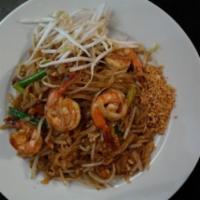 N1. Pad Thai · Sauteed rice noodles, eggs, scallions, bean sprouts and ground peanuts in tamarind sauce.