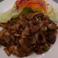 N5. Kouy Teaw Kua · Sauteed flat noodles, lettuce, scallions and eggs in light soy sauce.