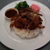 CS3. Crispy Duck over Rice · Crispy 1/4 duck served with steamed Chinese broccoli topped with homemade gravy sauce.