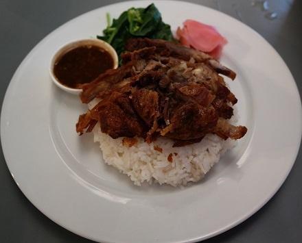 CS3. Crispy Duck over Rice · Crispy 1/4 duck served with steamed Chinese broccoli topped with homemade gravy sauce.