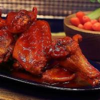 24 Piece Wings · Choice of boneless or regular wings. Served with two dipping sauces, choice of ranch or blue...