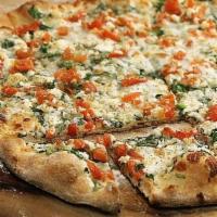 Spinach and Garlic Pizza · Olive oil, spinach, tomatoes, feta and fresh garlic. 
