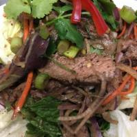Grilled Beef Salad · Our Thai salads are prepared with fresh lemongrass, lime leaves, mint leaves, cilantro and o...