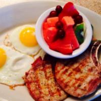 Pork Chops and Eggs · Two tender pork chops, served with two eggs and choice of 