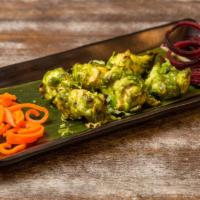 Hariyali Chicken Kabab Small Plate · Green herbed marinated grilled chicken.