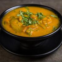 Vegetable Soup (Vegan) · Lentils cooked with vegetables, lemon flavor, curry leaves, and Indian spices.