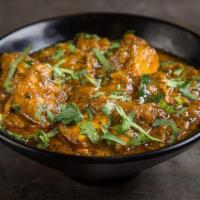 Black Pepper Chicken · Pepper marinade, curry leaves, and green chilies. Very spicy.