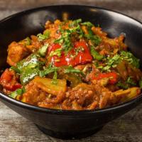 Chicken Kandhai · Chicken pieces cooked with onion, ginger, tomato in an iron wok, rich with spices zalore.