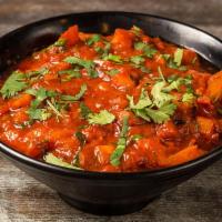 Rogan Josh · Lamb curry, fresh tomatoes, and saffron.