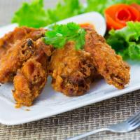 9. 7 Pieces Thai Corner Chicken Wing · Deep fried marinated chicken wing with Thai spice.
