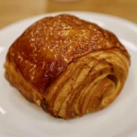 Pain Au Chocolate · Croissant filled with pieces of decadent dark chocolate inside.