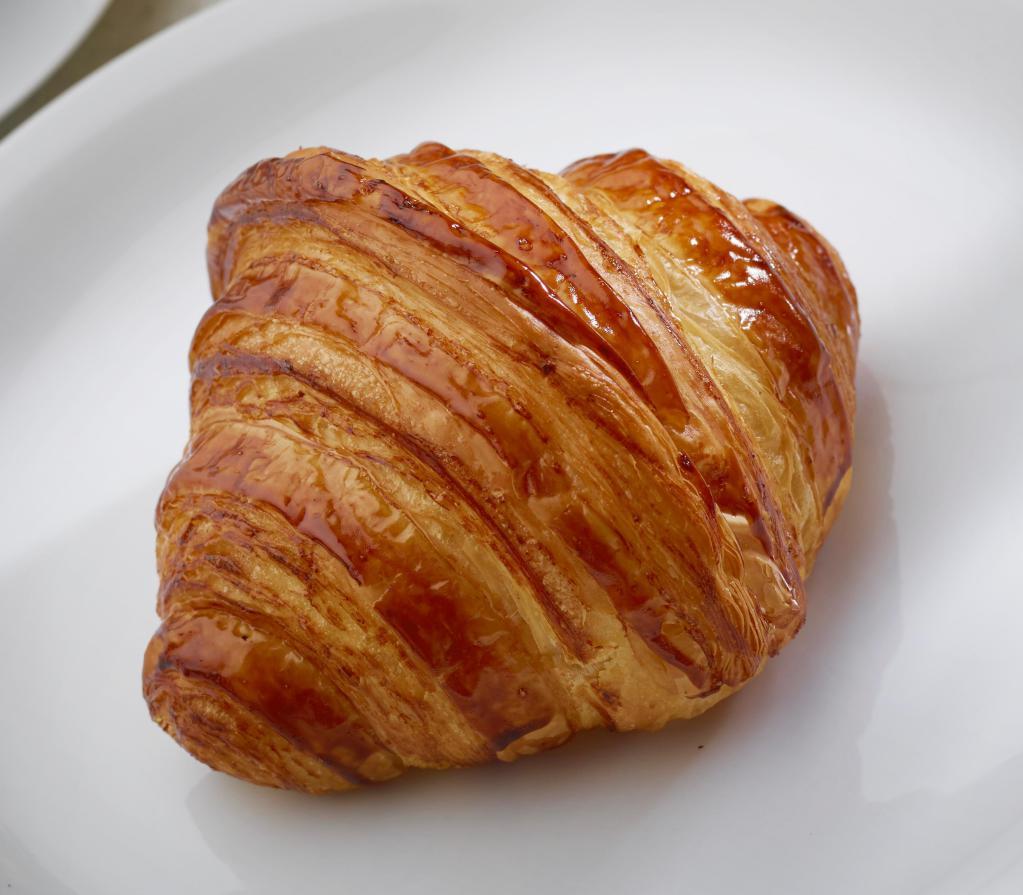 Croissant · Traditional French croissant, light and flaky - yet rich and buttery with a delicate interior.
