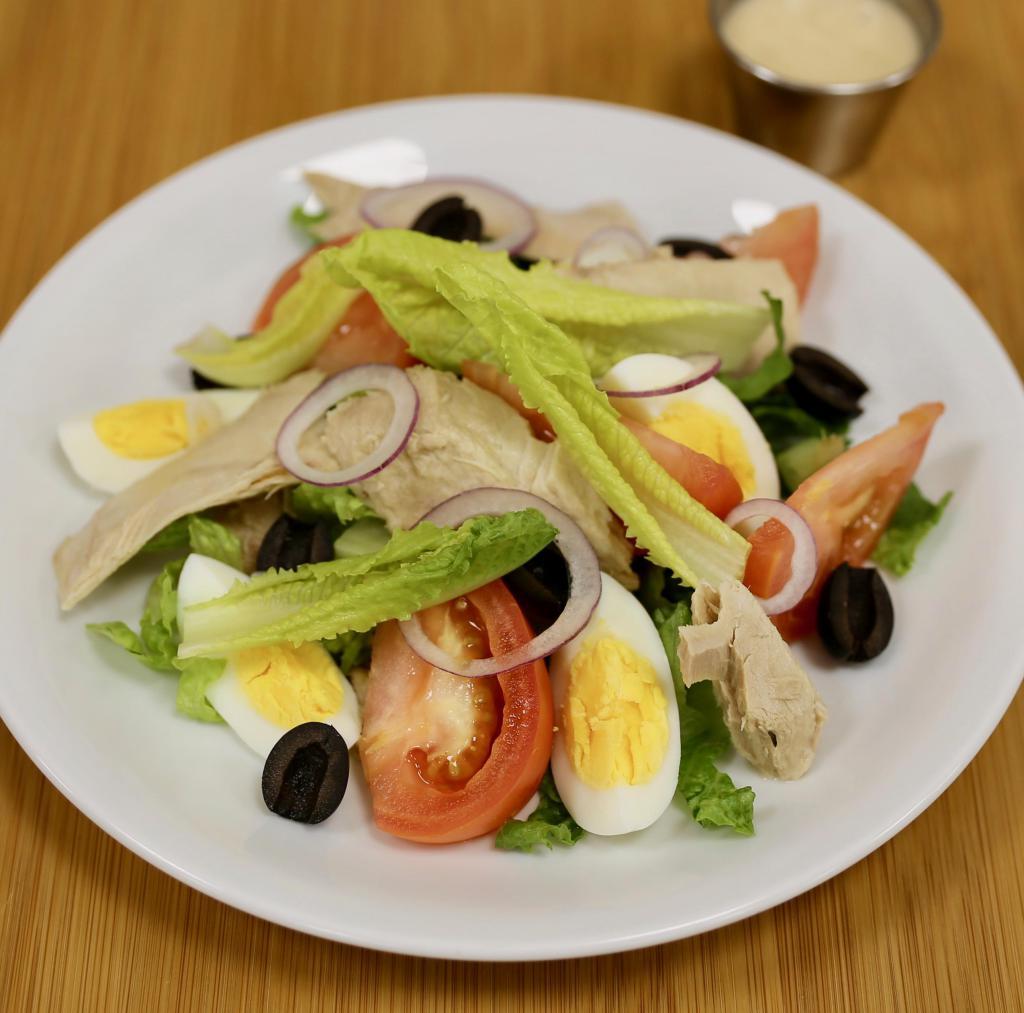 Salad Nicoise · Romaine, Tuna, Egg, Tomato, Black Olives, Red Onions, Vinaigrette Dressing