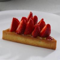 Strawberry Tart · Almond cream in a sweet pastry crust and topped with strawberries.