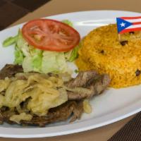 4. Carne Guisado · Beef stewed Puerto Rican style.