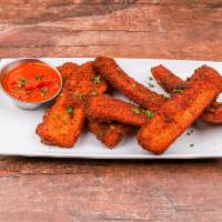 Mozzarella Frittes · Lightly breaded and served with marinara sauce.