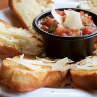 Bruschetta · Fresh tomatoes, garlic, basil and olive oil on lightly toasted bread.