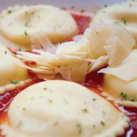 Four Cheese Blend Ravioli · Stuffed with ricotta, Parmesan, Asiago and Romano cheeses and served with fresh parsley, Ros...