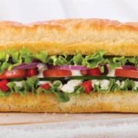 Veggie Sandwich · Feta, cucumber, red peppers, red onions, lettuce, Roma tomato, and creamy Mediterranean dres...