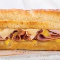 Ham and Swiss Sandwich · Ham, Swiss, and mustard sauce. Freshly baked on our Artisan bread.